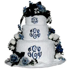 Wedding Towel Cake on The Towel Wedding Cake Has The Added Touch Of Colorful Threads And
